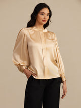 [Champagne] Champagne round-neck lantern-sleeve blouse on a model in a mid-length front view with arms relaxed and shoulders square. 004
