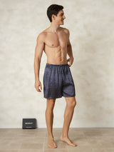 [Navy Ginkgo] Model wearing navy ginkgo print men's silk sleep shorts with elastic waist 005