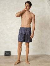 [Navy Ginkgo] Model wearing navy ginkgo print mulberry silk men's sleep shorts with elastic waistband 006